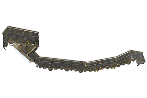 Lot 157 - In the manner of Thomas Jekyll, a pressed brass pelmet