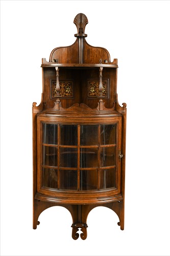 Lot 153 - A rosewood corner cupboard, possibly by Collinson & Locke