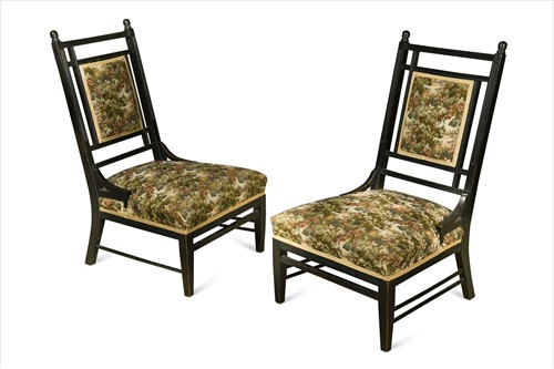 Lot 152 - In the manner of E. W. Godwin, a pair of ebonised side chairs