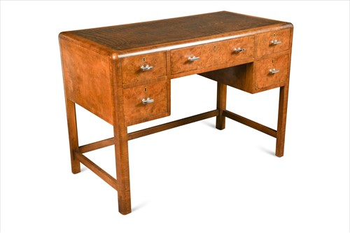 Lot 191 - An Art Deco Heal's leather inset walnut desk
