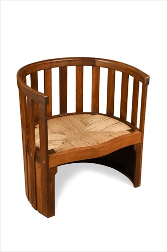 Lot 160 - Liberty & Co., a mahogany barrel-back tub chair