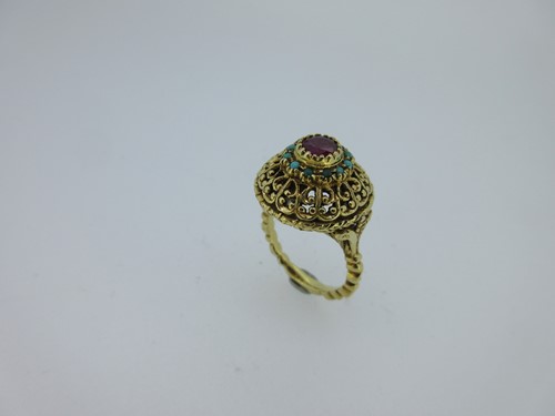 Lot 33 - An Eastern style ruby and turquoise ring