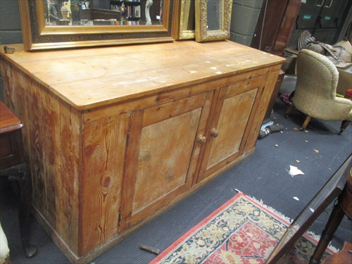 Lot 504 - A 19th century pitch pine cupboard