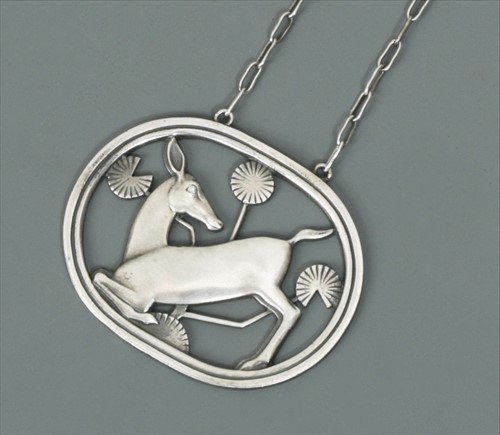 Lot 110 - Arno Malinowski for Georg Jensen, a Danish metalwares pendant and chain