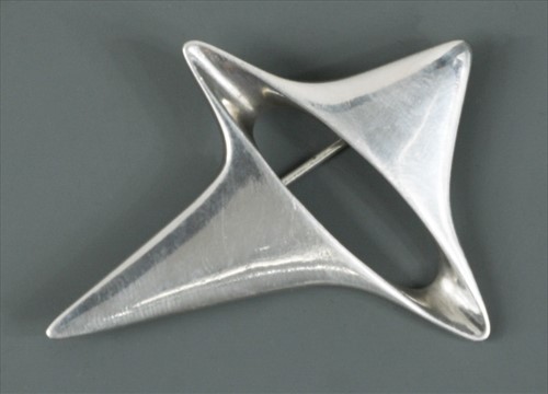 Lot 116 - Henning Koppel for Georg Jensen, a Danish metalwares brooch