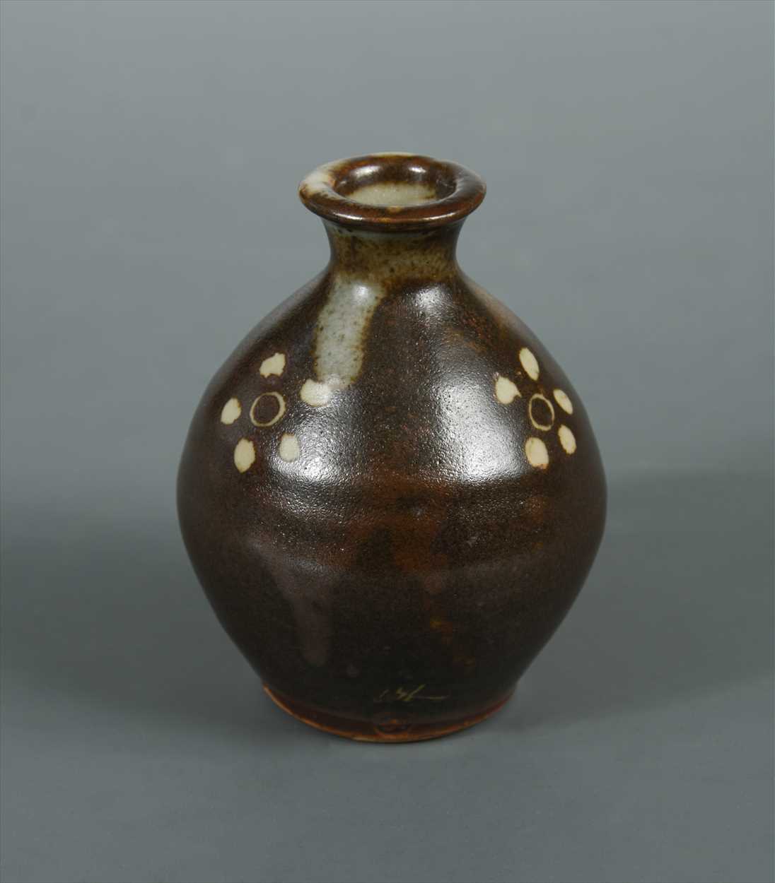 Lot 52 - Bernard Leach (British, 1887-1979), a miniature stoneware vase