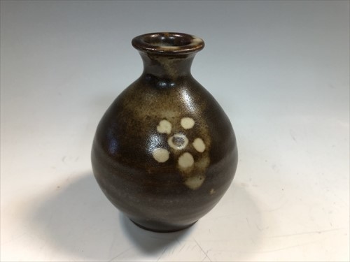 Lot 52 - Bernard Leach (British, 1887-1979), a miniature stoneware vase