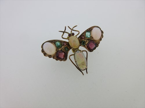 Lot 92 - An opal and gemset butterfly brooch