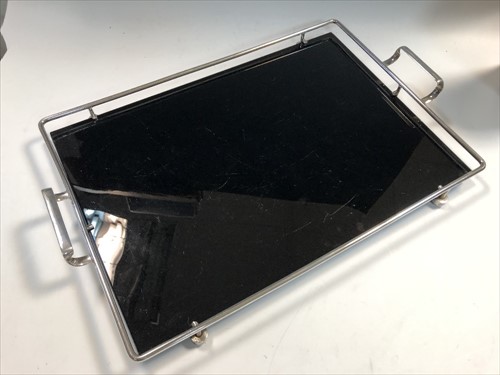 Lot 139 - A mid-century black glass and chrome drinks tray