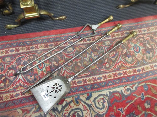 Lot 463 - A pair of brass fire ball of turned ball...