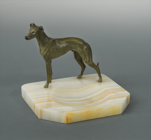 Lot 253 - A 1930s cold painted bronze standing greyhound