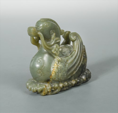 Lot 17 - A Chinese jade carved duck in Qianlong archaic style