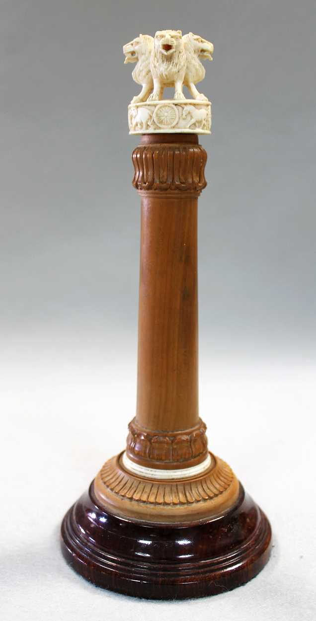 Lot 250 - A Ceylonese carved wood and ivory Capital of Ashoka desk piece, circa 1930