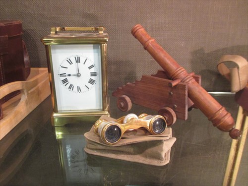 Lot 38 - A French carriage timepiece, opera glasses and model canon.