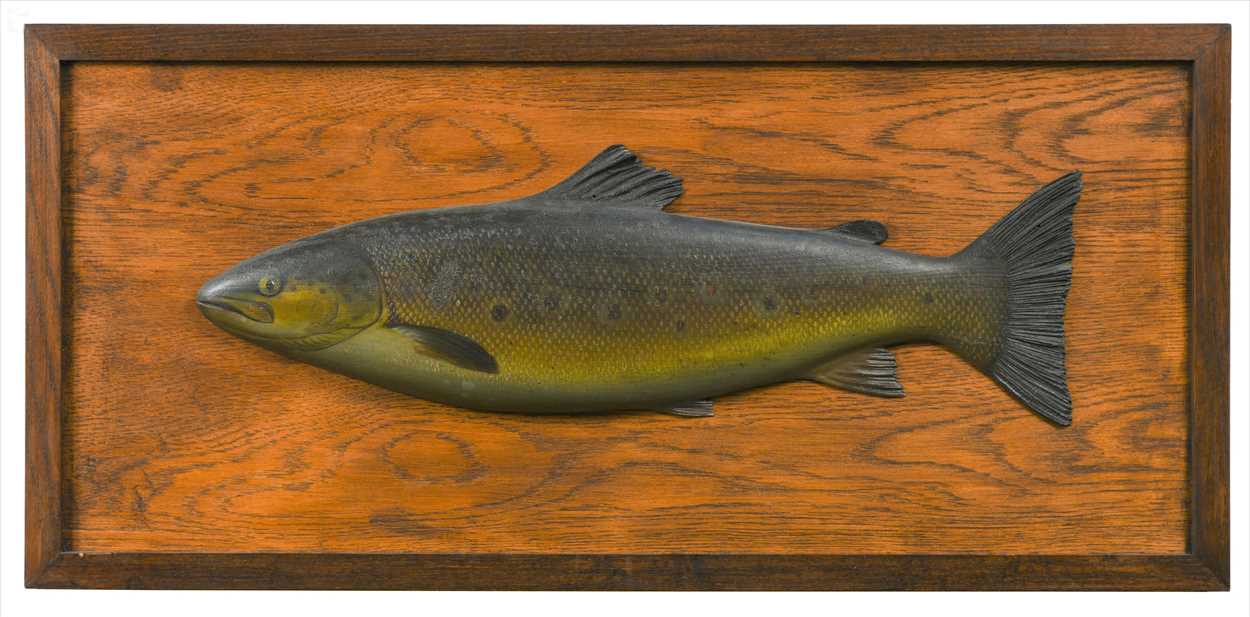 Lot 374 - A carved and painted wood half block model of a trout
