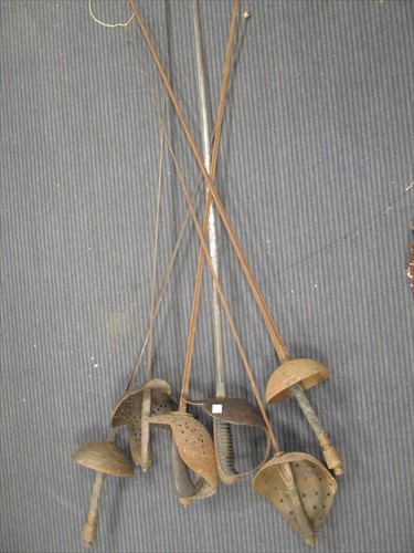 Lot 129 - A pair of early 20th century military fencing...