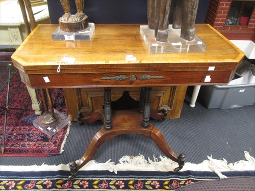 Lot 580 - A Regency mahogany, rosewood and brass mounted...