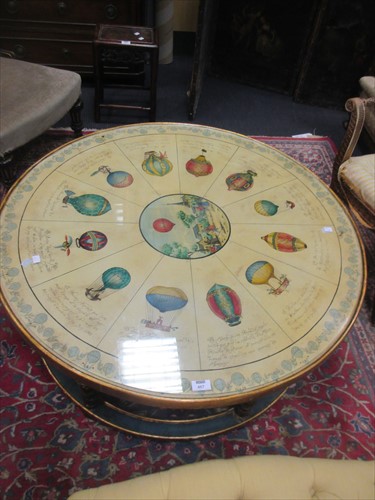 Lot 467 - A modern circular gilt coffee table, with...