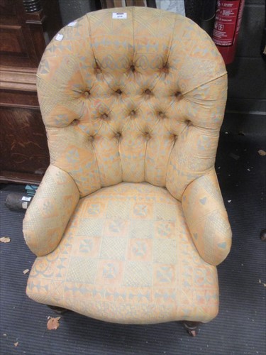 Lot 510 - A Victorian button back nursing chair on...