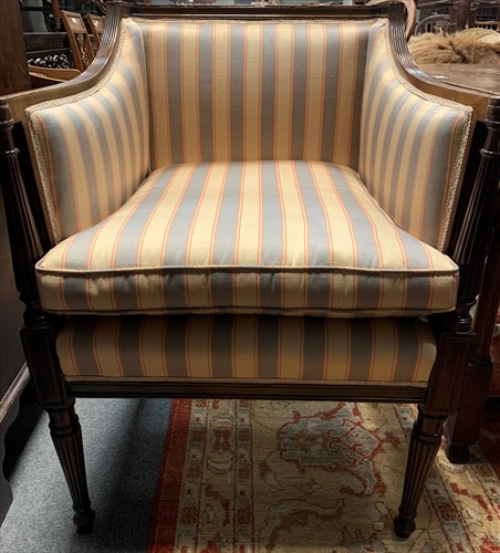 Lot 614 - An Edwardian mahogany upholstered square...