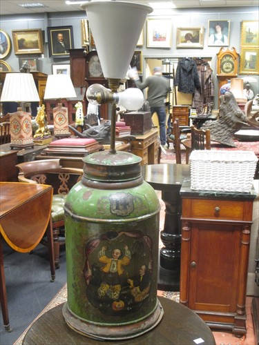 Lot 157 - A 19th century painted tin tea cannister the...