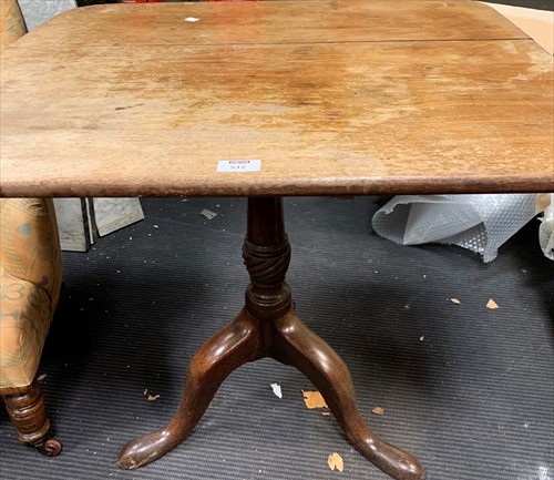 Lot 512 - A George III mahoagny tripod table, with...