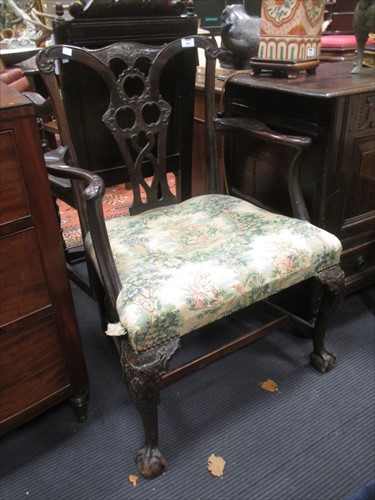 Lot 563 - A George III style carved mahogany dining...
