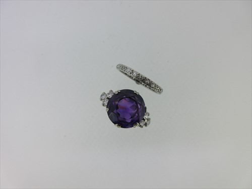 Lot 224 - An amethyst and diamond ring together with a full hoop diamond eternity ring