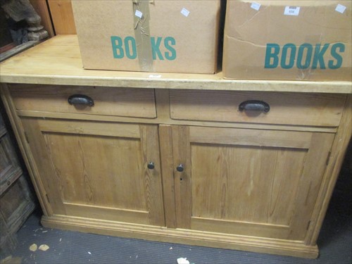 Lot 520 - An early 20th century pine dresser base with...