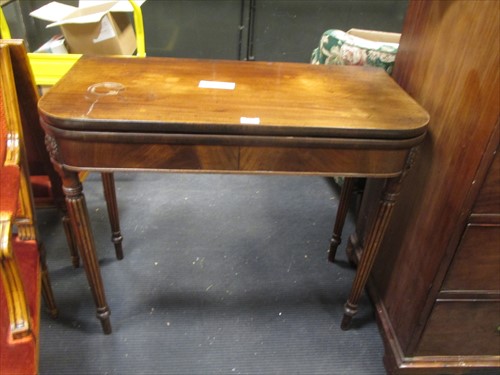 Lot 525 - A George IV mahogany fold over tea table, 76 x...