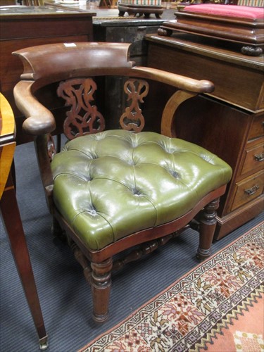 Lot 559 - A Victorian mahogany smokers bow armchair with...