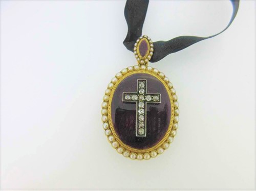 Lot 239 - A Victorian diamond, enamel and seed pearl pendant locket