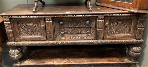 Lot 625 - A 17th century style oak sideboard with carved...