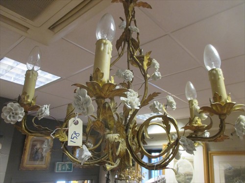 Lot 659 - A 20th century gilt metal and porcelain...