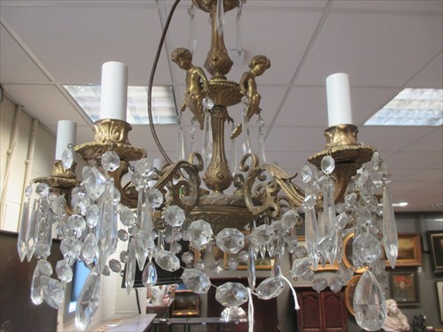 Lot 660 - A mid 20th century glass and drop chandelier