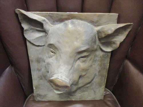 Lot 295 - A modern resin in relief of a pig's head, 40 x...
