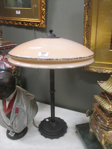 Lot 297 - A 1930's style bronze lamp with peach glass shade