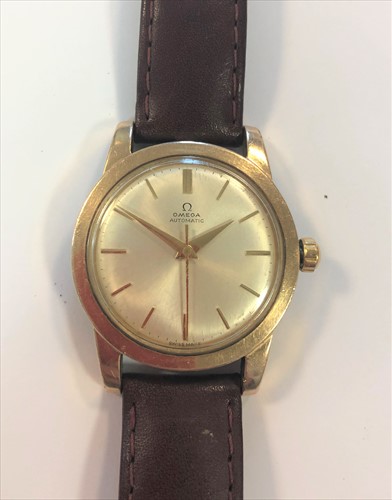 Lot 284 - Omega - A gentleman's 'rose gold capped' early 'Seamaster' ' bumper' wristwatch
