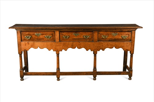 Lot 293 - A George III North Country oak and mahogany banded dresser base, late 18th century