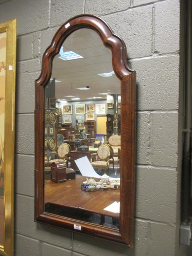 Lot 453 - Queen Anne style walnut arched frame wall...