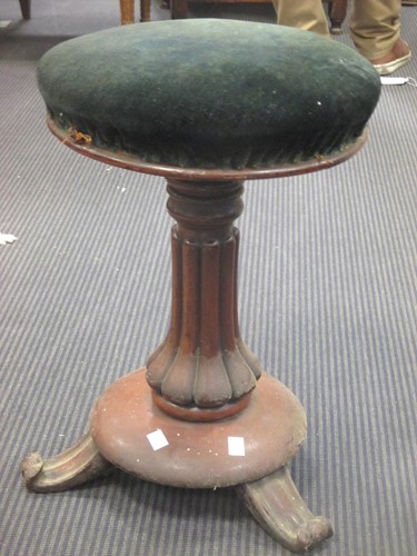 Lot 524 - An early Victorian mahogany piano stool with...
