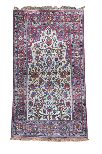 Lot 335 - An Isfahan silk prayer rug, early 20th century