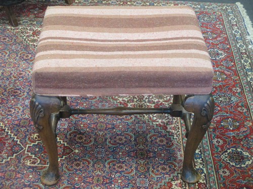 Lot 523 - A George I reproduction walnut stool, on...