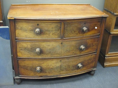 Lot 480 - A George III mahogany bow fronted small chest...