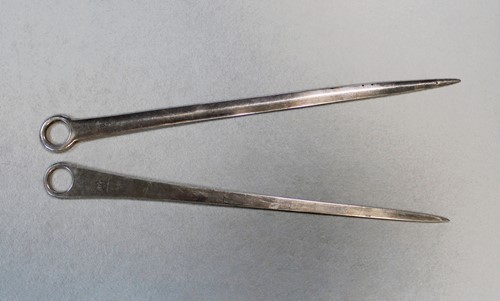 Lot 402 - Two George III silver meat skewers