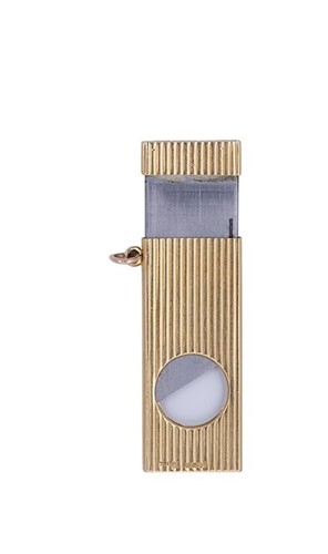 Lot 370 - An 18ct gold pocket guillotine cigar cutter retailed by Van Cleef & Arpels