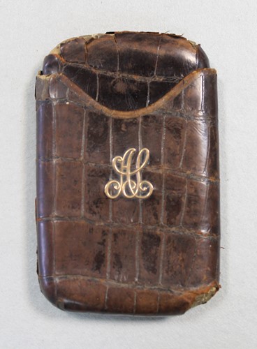 Lot 71 - An early 20th century crocodile leather pocket cigar case