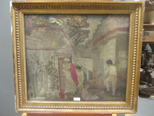 Lot 296 - A 19th century woolwork picture of a country...