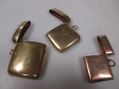 Lot 194 - Three 9ct gold vesta cases