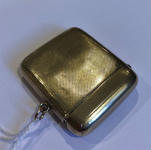 Lot 369 - An Edward VII 9ct gold vesta case with secret photograph aperture